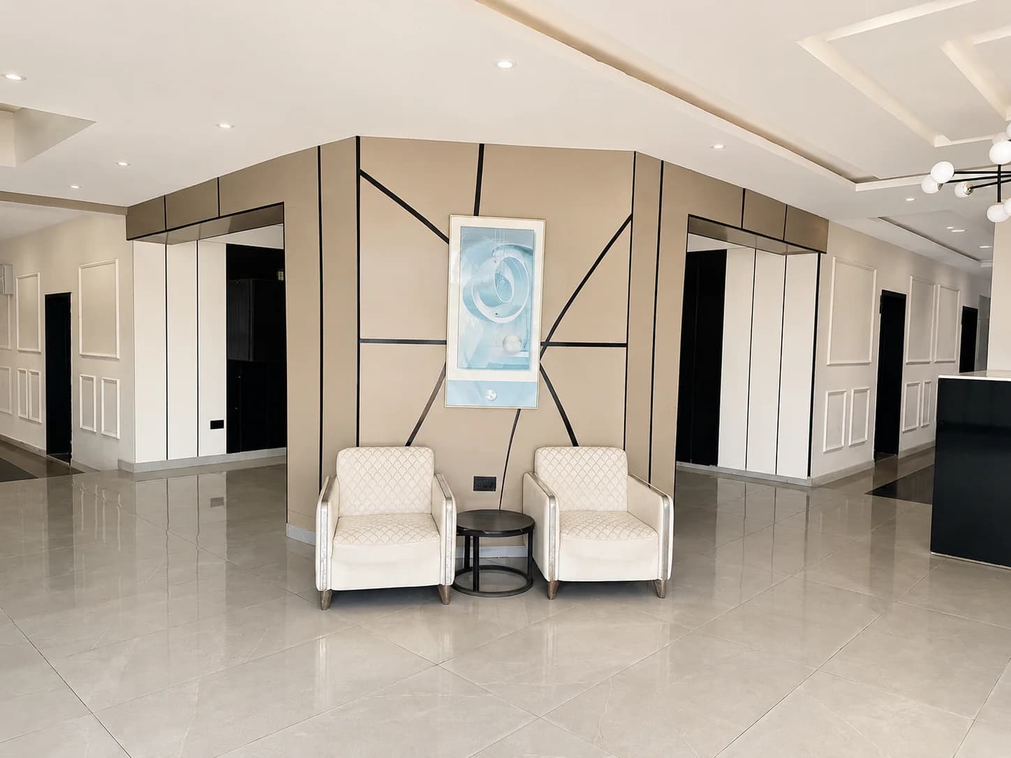 Guest lobby seating inside Ellysam Hotel and Suites